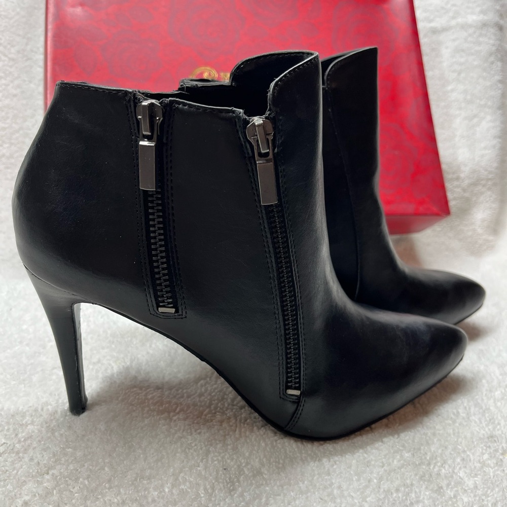 Elegant Black Ankle Boots by Carlos Santana